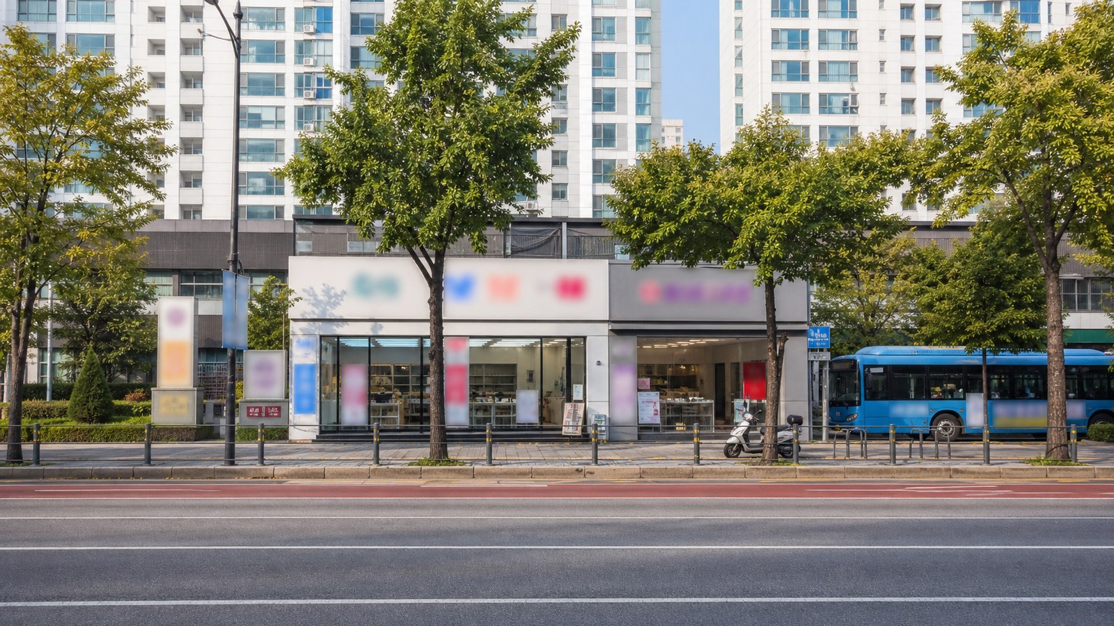 홍제역 통일로변 상가와 인왕산 자락이 보이는 평일 낮 거리 풍경, 홍제 휴대폰 매장가